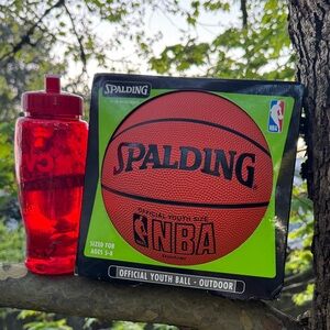 NWT Official Outdoor Spalding NBA Youth Basketball, sized for ages 5-8.